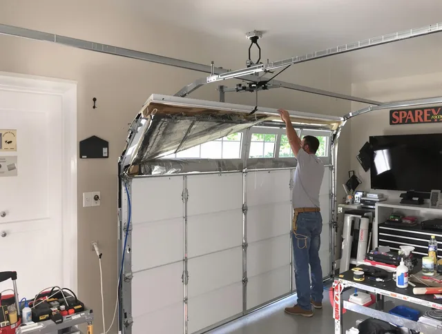 Garage door section replacement by Norwalk Garage Door Repair in Norwalk