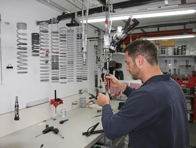 Norwalk Garage Door Repair safety certified technician performing precision spring replacement in Norwalk