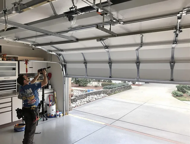 Garage door track repair service by Norwalk Garage Door Repair in Norwalk